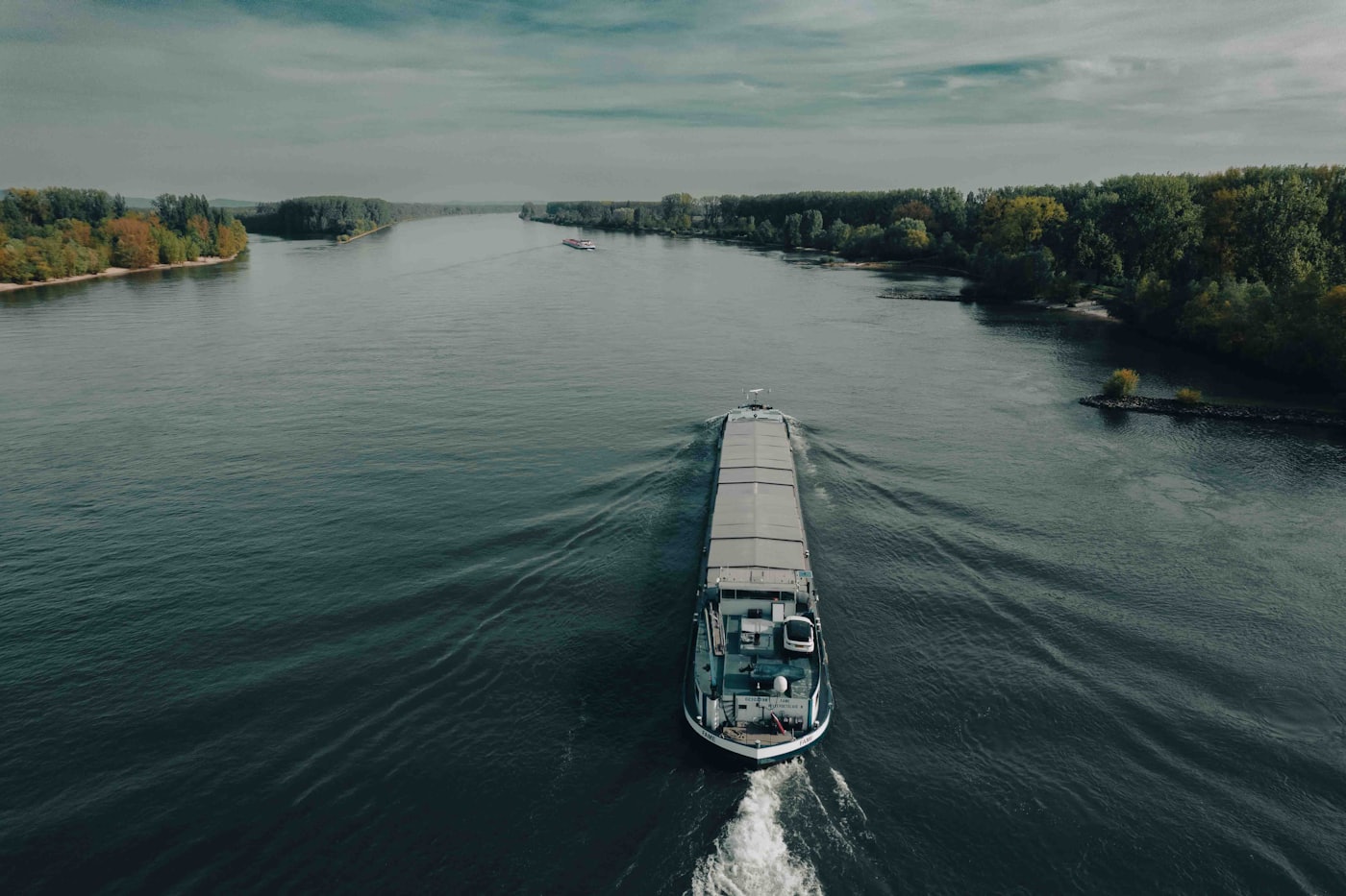 An inland barge on a river